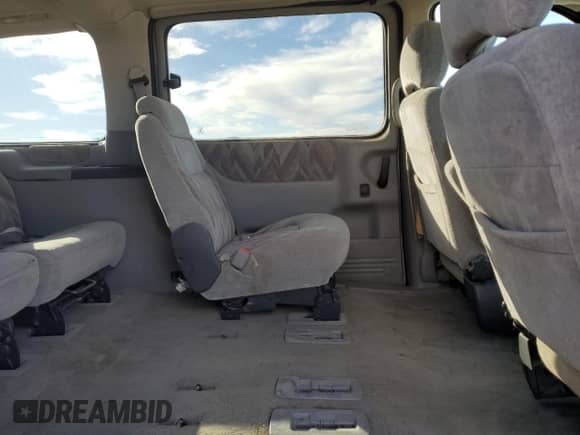 1999 Chevrolet Venture с VIN 1GNDX03E4XD258150, выставлен на аукционе Copart как лот 85884485 с пробегом 188 449 миль миль и Чистый • Clean title. История ставок и продаж доступна на DreamBid. Изображение 11.