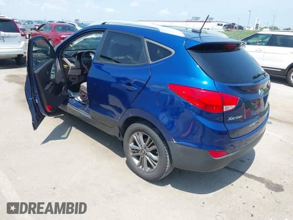 2015 Hyundai Tucson SE with VIN KM8JU3AG6FU987366, listed as a IAAI auction lot 42775890 with 84,499 mi miles and . Bid and sale history available at DreamBid. Image 3.
