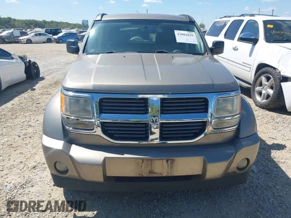2007 Dodge Nitro SLT with VIN 1D8GU58K27W612800, listed as a IAAI auction lot 43081829 with 98,319 mi miles and . Bid and sale history available at DreamBid. Image 6.