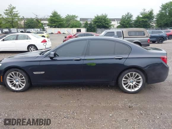 2013 BMW 7 Series 750i xDrive with VIN WBAYB6C50DC998045, listed as a IAAI auction lot 42450110 with 102,068 mi miles and . Bid and sale history available at DreamBid. Image 14.