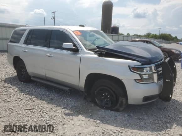 2015 Chevrolet Tahoe Commercial with VIN 1GNLC2EC4FR277653, listed as a Copart auction lot 69478765 with Not provided miles and Salvage title. Bid and sale history available at DreamBid. Image 4.
