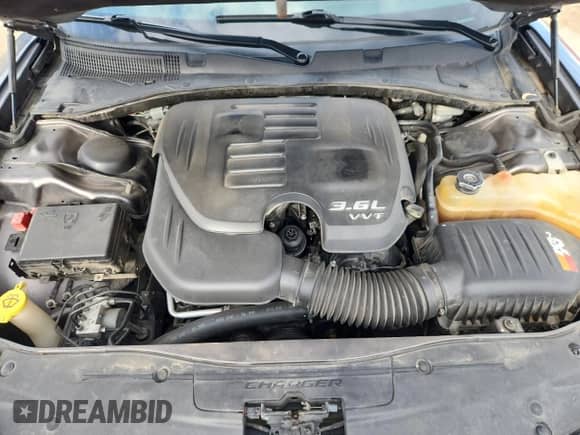 2015 Dodge Charger SE with VIN 2C3CDXBG7FH726886, listed as a Copart auction lot 80687465 with 153,436 mi miles and Salvage title. Bid and sale history available at DreamBid. Image 11.