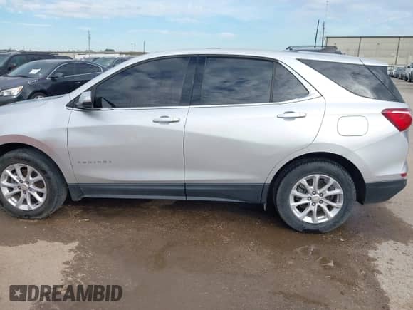 2018 Chevrolet Equinox LT with VIN 3GNAXJEV0JS544445, listed as a IAAI auction lot 40983664 with 105,832 mi miles and . Bid and sale history available at DreamBid. Image 14.
