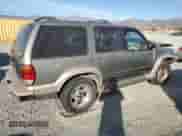 2000 Ford Explorer Eddie Bauer with VIN 1FMDU74E2YZB30465, listed as a Copart auction lot 87244384 with 166,225 mi miles and Salvage title. Bid and sale history available at DreamBid. Image 3.