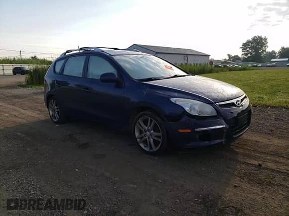 2012 Hyundai Elantra GLS z VIN KMHDC8AE8CU138170, wystawiony jako Copart lot #67416755 z przebiegiem 155 676 mil mil oraz Szkoda całkowita • Salvage title. Historia ofert i sprzedaży dostępna na DreamBid. Obrazek 13.