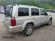 2007 Jeep Commander Limited z VIN 1J8HG58227C589152, wystawiony jako Copart lot #64929945 z przebiegiem 165 182 mil mil oraz Szkoda całkowita • Salvage title. Historia ofert i sprzedaży dostępna na DreamBid. Obrazek 3.