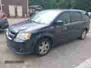 2013 Dodge Grand Caravan Crew with VIN 2C4RDGDG1DR615583, listed as a IAAI auction lot 43085808 with 140,638 mi miles and . Bid and sale history available at DreamBid. Image 2.