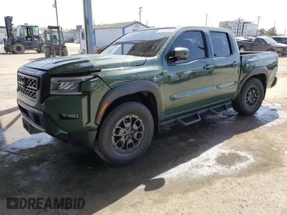 2023 Nissan Frontier Pro-X with VIN 1N6ED1EJ6PN670843, listed as a Copart auction lot 51841865 with 8,825 mi miles and Salvage title. Bid and sale history available at DreamBid. Image 1.