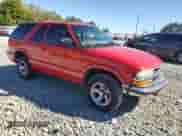 2000 Chevrolet Blazer LS с VIN 1GNCS18W9YK241469, выставлен на аукционе Copart как лот 75532144 с пробегом 216 870 миль миль и Списание • Salvage title. История ставок и продаж доступна на DreamBid. Изображение 4.