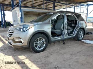 2018 Hyundai Santa Fe 2.4L с VIN 5NMZU3LB5JH053756, выставлен на аукционе Copart как лот 70347355 с пробегом 30 817 миль миль и Списание • Salvage title. История ставок и продаж доступна на DreamBid. Изображение 1.