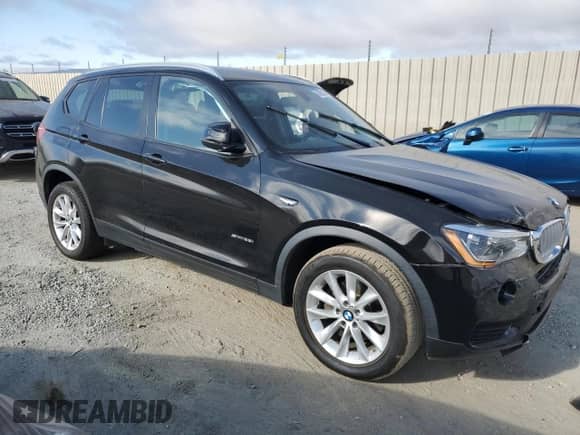 2015 BMW X3 sDrive28i with VIN 5UXWZ7C54F0M83421, listed as a Copart auction lot 63856585 with 77,689 mi miles and Salvage title. Bid and sale history available at DreamBid. Image 4.