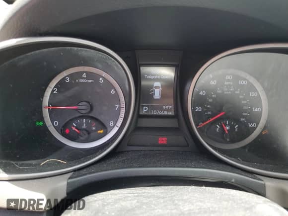 2015 Hyundai Santa Fe z VIN 5XYZTDLB8FG246090, wystawiony jako Copart lot #66717495 z przebiegiem 107 608 mil mil oraz Szkoda całkowita • Salvage title. Historia ofert i sprzedaży dostępna na DreamBid. Obrazek 9.