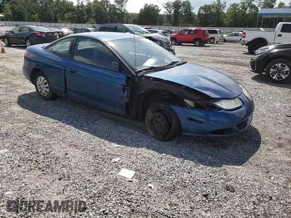 2002 Saturn SC with VIN 1G8ZP12852Z202191, listed as a Copart auction lot 64678935 with 170,757 mi miles and Salvage title. Bid and sale history available at DreamBid. Image 13.