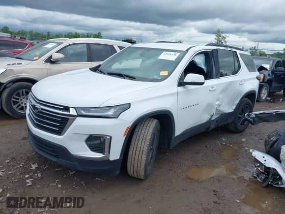 2023 Chevrolet Traverse LT with VIN 1GNEVHKW4PJ187925, listed as a IAAI auction lot 42318138 with 62,612 mi miles and . Bid and sale history available at DreamBid. Image 17.