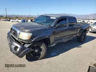 2011 Toyota Tacoma с VIN 3TMMU4FN3BM034062, выставлен на аукционе Copart как лот 85011125 с пробегом 166 224 миль миль и Списание • Salvage title. История ставок и продаж доступна на DreamBid. Изображение 1.
