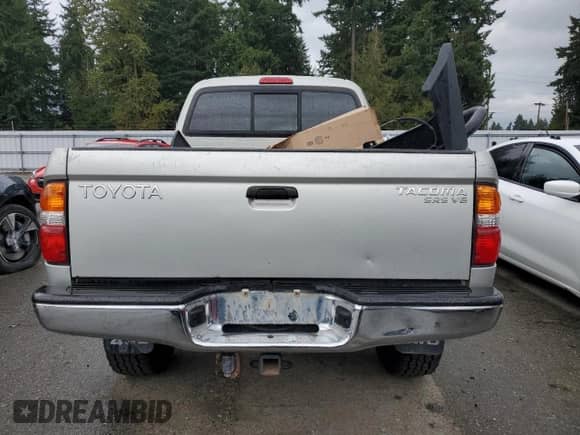 2002 Toyota Tacoma with VIN 5TEHN72N32Z102014, listed as a Copart auction lot 86868935 with 194,363 mi miles and Salvage title. Bid and sale history available at DreamBid. Image 6.