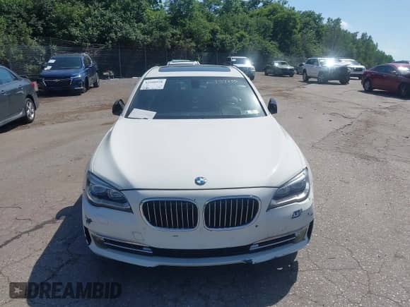 2013 BMW 7 Series 750Li xDrive with VIN WBAYF8C51DD139735, listed as a IAAI auction lot 42590928 with 118,984 mi miles and . Bid and sale history available at DreamBid. Image 12.