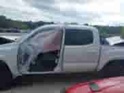 2021 Toyota Tacoma SR with VIN 3TMCZ5AN9MM408574, listed as a IAAI auction lot 43201280 with Not provided miles and . Bid and sale history available at DreamBid. Image 14.