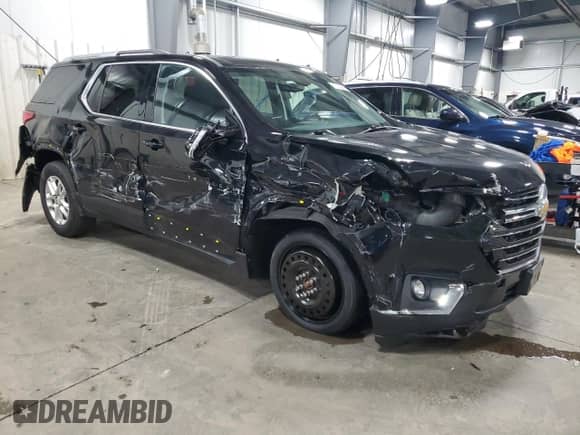 2018 Chevrolet Traverse LT Cloth с VIN 1GNEVGKW8JJ213654, выставлен на аукционе Copart как лот 71013295 с пробегом 105 133 миль миль и Списание • Salvage title. История ставок и продаж доступна на DreamBid. Изображение 4.