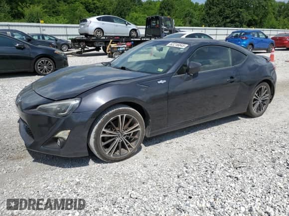 2014 Scion FR-S z VIN JF1ZNAA13E8701961, wystawiony jako Copart lot #62216845 z przebiegiem Nie podano mil oraz Czysty tytuł • Clean title. Historia ofert i sprzedaży dostępna na DreamBid. Obrazek 1.