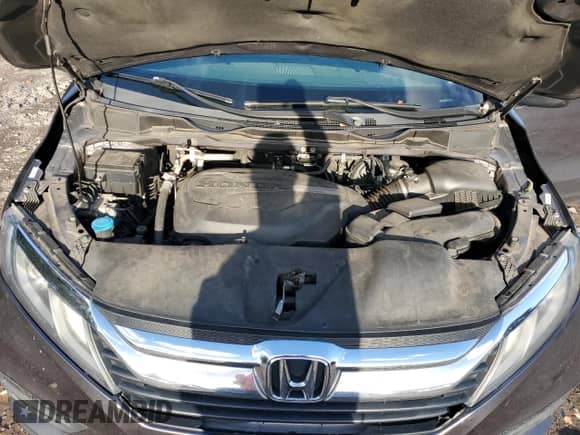 2020 Honda Odyssey LX with VIN 5FNRL6H20LB047462, listed as a Copart auction lot 82296145 with 61,618 mi miles and Salvage title. Bid and sale history available at DreamBid. Image 12.