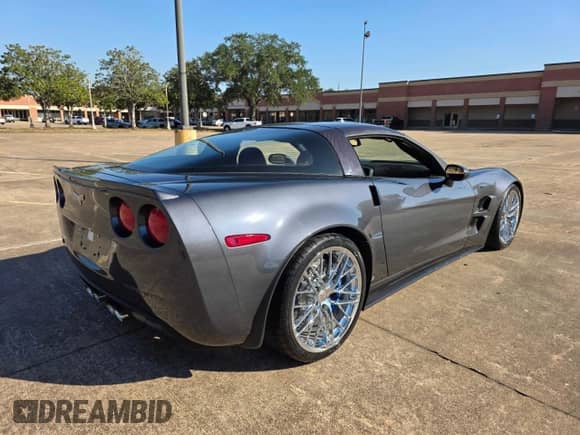 2009 Chevrolet Corvette ZR1 3ZR with VIN 1G1YR26R695800384, listed as a Copart auction lot 87475215 with 1,951 mi miles and Salvage title. Bid and sale history available at DreamBid. Image 4.