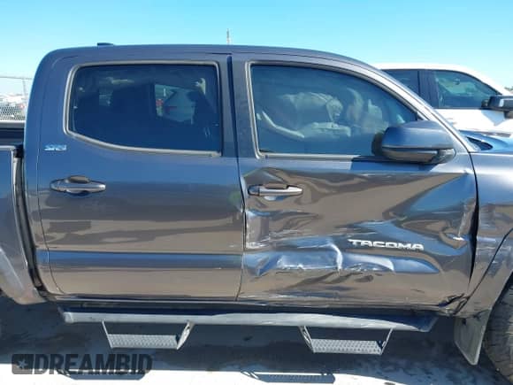 2021 Toyota Tacoma SR5 with VIN 5TFAZ5CN0MX106119, listed as a IAAI auction lot 42812735 with 70,968 mi miles and . Bid and sale history available at DreamBid. Image 13.