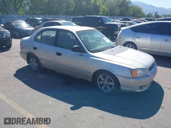 2002 Hyundai Accent GL z VIN KMHCG45C62U336245, wystawiony jako IAAI lot #42312838 z przebiegiem 310 753 mil mil oraz . Historia ofert i sprzedaży dostępna na DreamBid. Obrazek 1.