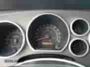 2013 Toyota Tundra z VIN 5TFUM5F1XDX046077, wystawiony jako Copart lot #65893365 z przebiegiem 240 153 mil mil oraz Szkoda całkowita • Salvage title. Historia ofert i sprzedaży dostępna na DreamBid. Obrazek 9.