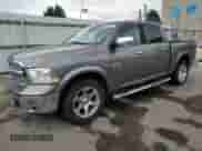 2013 Ram 1500 Laramie with VIN 1C6RR7NT2DS525362, listed as a Copart auction lot 65968445 with 154,195 mi miles and Salvage title. Bid and sale history available at DreamBid. Image 1.