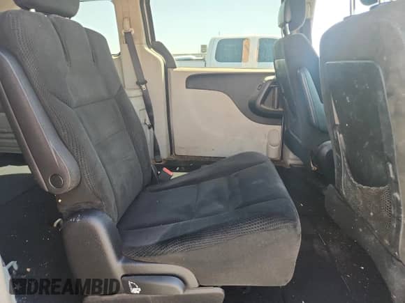 2015 Dodge Grand Caravan SXT z VIN 2C4RDGCG4FR745801, wystawiony jako Copart lot #71855195 z przebiegiem 182 889 mil mil oraz Czysty tytuł • Clean title. Historia ofert i sprzedaży dostępna na DreamBid. Obrazek 11.