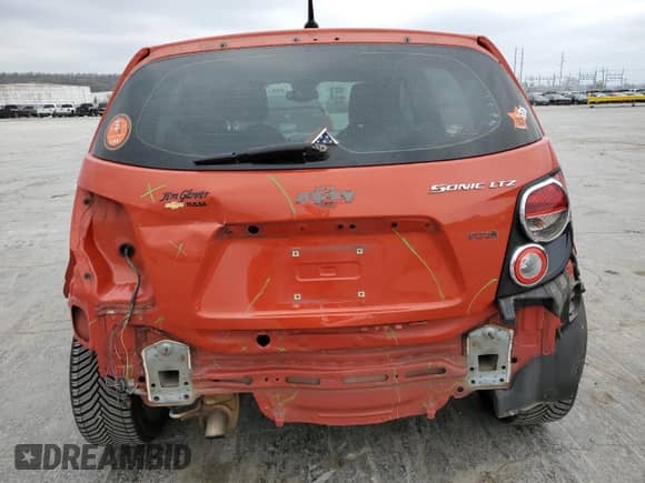 2013 Chevrolet Sonic LTZ с VIN 1G1JE6SB2D4225471, выставлен на аукционе Copart как лот 50703475 с пробегом 105 733 миль миль и Списание • Salvage title. История ставок и продаж доступна на DreamBid. Изображение 6.