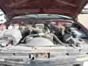 1996 GMC Sierra 1500 z VIN 2GTEC19R8T1553685, wystawiony jako IAAI lot #41503682 z przebiegiem 238 634 mil mil oraz . Historia ofert i sprzedaży dostępna na DreamBid. Obrazek 10.