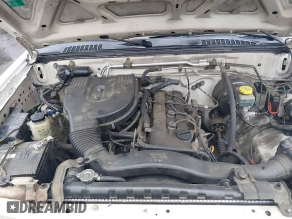 2003 Nissan Frontier XE z VIN 1N6DD26T03C458432, wystawiony jako IAAI lot #41799157 z przebiegiem 181 069 mil mil oraz . Historia ofert i sprzedaży dostępna na DreamBid. Obrazek 10.