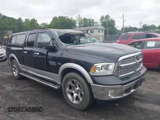 2014 Ram 1500 Laramie with VIN 1C6RR7JT8ES276301, listed as a IAAI auction lot 42606846 with 118,316 mi miles and . Bid and sale history available at DreamBid. Image 1.