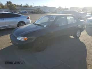 1999 Chevrolet Prizm z VIN 1Y1SK5289XZ411868, wystawiony jako Copart lot #79348064 z przebiegiem 175 202 mil mil oraz Czysty tytuł • Clean title. Historia ofert i sprzedaży dostępna na DreamBid. Obrazek 1.