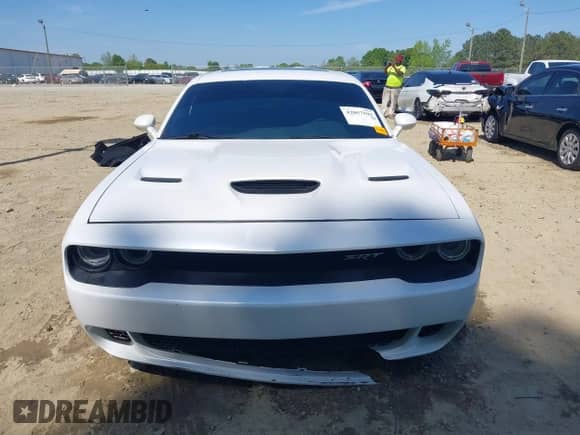 2016 Dodge Challenger SRT Hellcat with VIN 2C3CDZC99GH239296, listed as a IAAI auction lot 42057592 with 63,826 mi miles and . Bid and sale history available at DreamBid. Image 12.