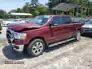 2022 Ram 1500 Lone Star with VIN 1C6RREFT0NN228044, listed as a Copart auction lot 57101745 with 25,480 mi miles and Salvage title. Bid and sale history available at DreamBid. Image 1.