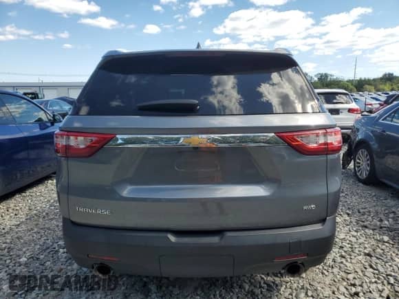 2019 Chevrolet Traverse LS with VIN 1GNEVFKW7KJ205413, listed as a Copart auction lot 69608585 with 76,091 mi miles and Salvage title. Bid and sale history available at DreamBid. Image 6.