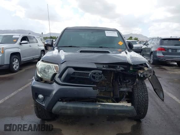 2015 Toyota Tacoma PreRunner z VIN 3TMJU4GN0FM185366, wystawiony jako IAAI lot #43316251 z przebiegiem 77 520 mil mil oraz . Historia ofert i sprzedaży dostępna na DreamBid. Obrazek 12.