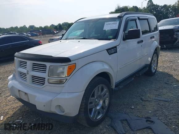 2011 Dodge Nitro Heat with VIN 1D4PU4GX0BW564036, listed as a IAAI auction lot 42855542 with 156,845 mi miles and . Bid and sale history available at DreamBid. Image 2.