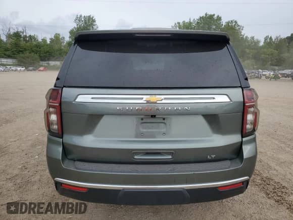 2023 Chevrolet Suburban LT with VIN 1GNSKCKD2PR164058, listed as a Copart auction lot 70387065 with 58,551 mi miles and Salvage title. Bid and sale history available at DreamBid. Image 6.