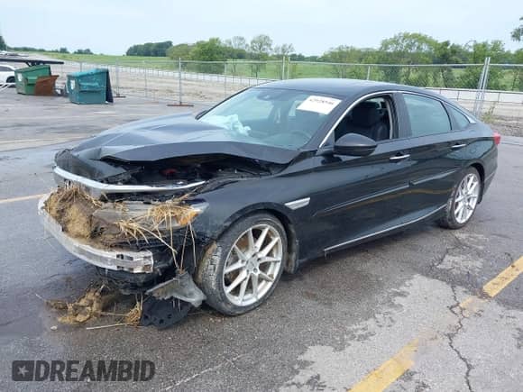 2018 Honda Accord Touring with VIN 1HGCV2F90JA007429, listed as a IAAI auction lot 42928546 with 53,984 mi miles and . Bid and sale history available at DreamBid. Image 18.