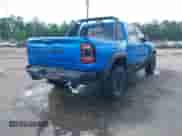 2021 Ram 1500 TRX with VIN 1C6SRFU98MN804461, listed as a IAAI auction lot 42300032 with 28,735 mi miles and . Bid and sale history available at DreamBid. Image 4.