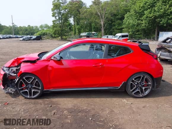 2022 Hyundai Veloster z VIN KMHT36AH5NU015388, wystawiony jako IAAI lot #42492097 z przebiegiem 31 757 mil mil oraz . Historia ofert i sprzedaży dostępna na DreamBid. Obrazek 14.