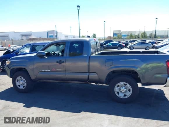 2018 Toyota Tacoma SR with VIN 5TFRX5GN1JX118441, listed as a IAAI auction lot 41870266 with 95,612 mi miles and . Bid and sale history available at DreamBid. Image 15.