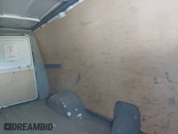 2007 Ford Econoline Cargo Commercial with VIN 1FTNE24W47DA99927, listed as a IAAI auction lot 42643800 with Not provided miles and . Bid and sale history available at DreamBid. Image 8.