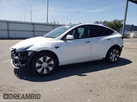 2023 Tesla Model Y Long Range с VIN 7SAYGDEE0PF637947, выставлен на аукционе Copart как лот 61927575 с пробегом 57 538 миль миль и Списание • Salvage title. История ставок и продаж доступна на DreamBid. Изображение 1.