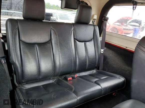 2014 Jeep Wrangler Sahara z VIN 1C4AJWBG0EL148282, wystawiony jako Copart lot #65809385 z przebiegiem 122 443 mil mil oraz Szkoda całkowita • Salvage title. Historia ofert i sprzedaży dostępna na DreamBid. Obrazek 10.