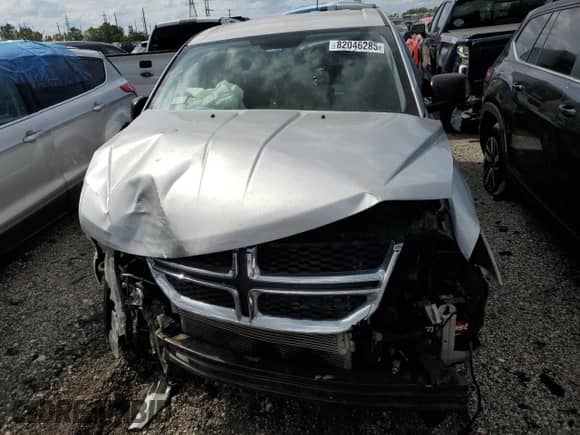 2013 Dodge Journey American Value с VIN 3C4PDCAB5DT701064, выставлен на аукционе Copart как лот 82046285 с пробегом Не указан миль и Списание • Salvage title. История ставок и продаж доступна на DreamBid. Изображение 5.